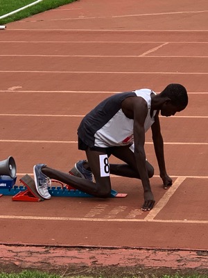 Runner on starting blocks